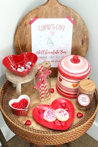 Adorable hot chocolate bar idea with free Cupid's Cafe printable.