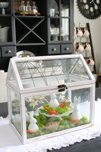 White Easter terrarium with white bunnies.