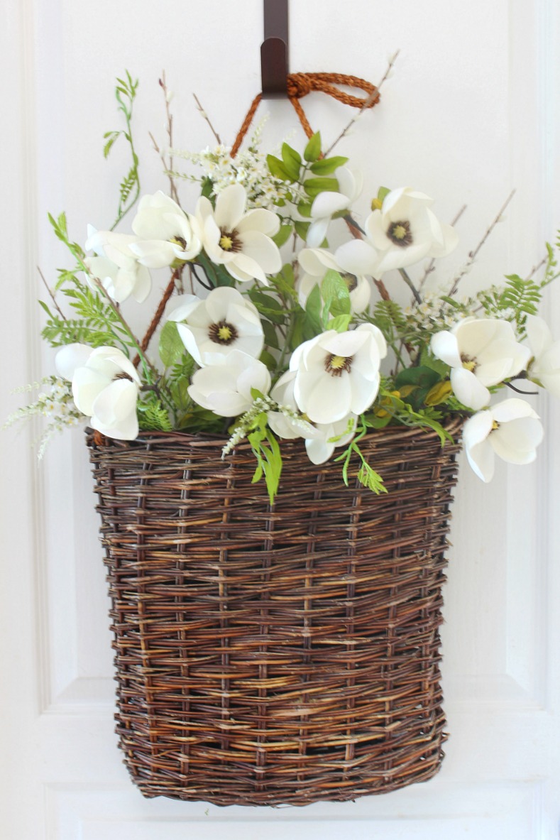 Summer basket wreath tutorial step 3. Basket with flowers and greenery.