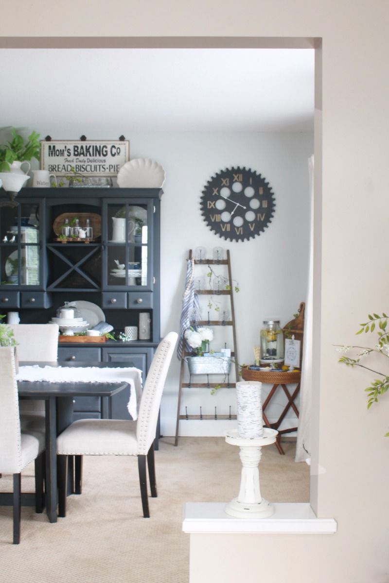 Farmhouse style dining room decorated for summer.