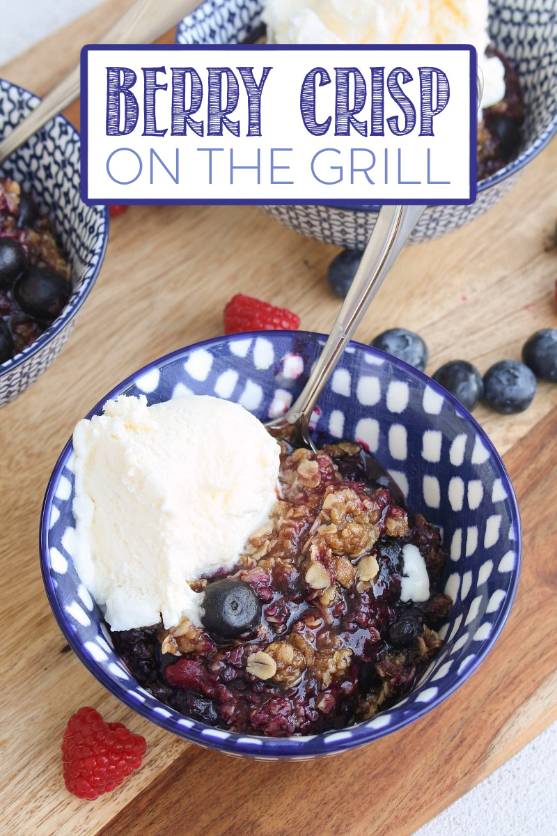 Bowl of delicious berry crisp made on the grill.