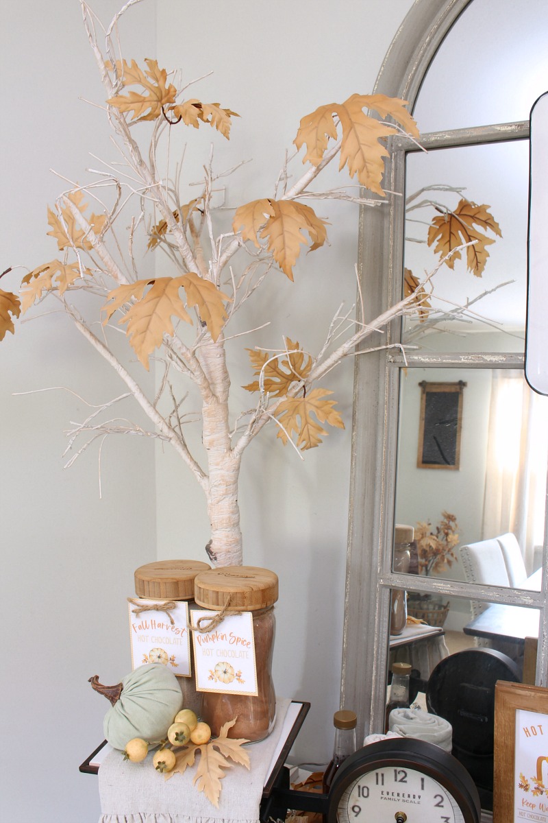 DIY lighted fall tree in a fall beverage bar.