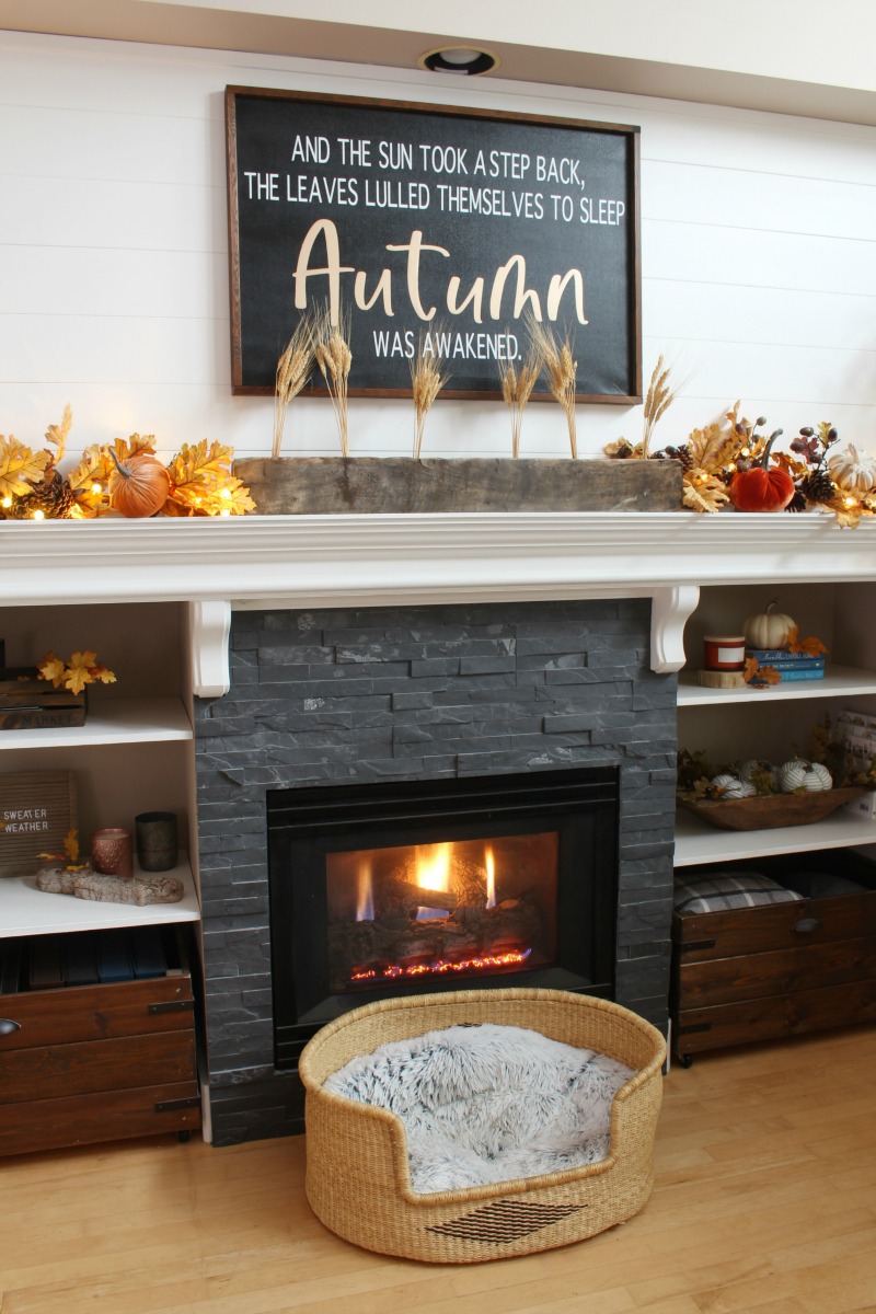 Cozy fall mantel decor ideas using traditional fall colors and lights.