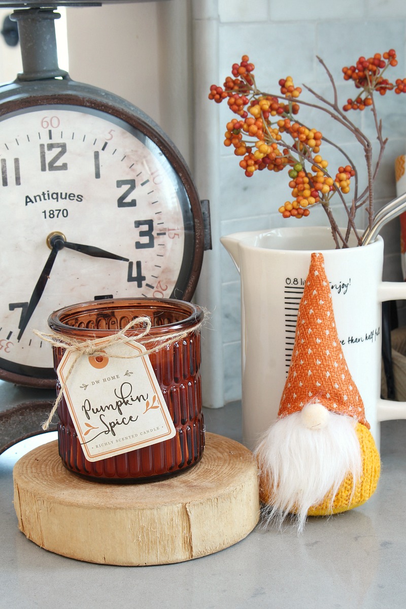 Fall candle with cute fall gnome.