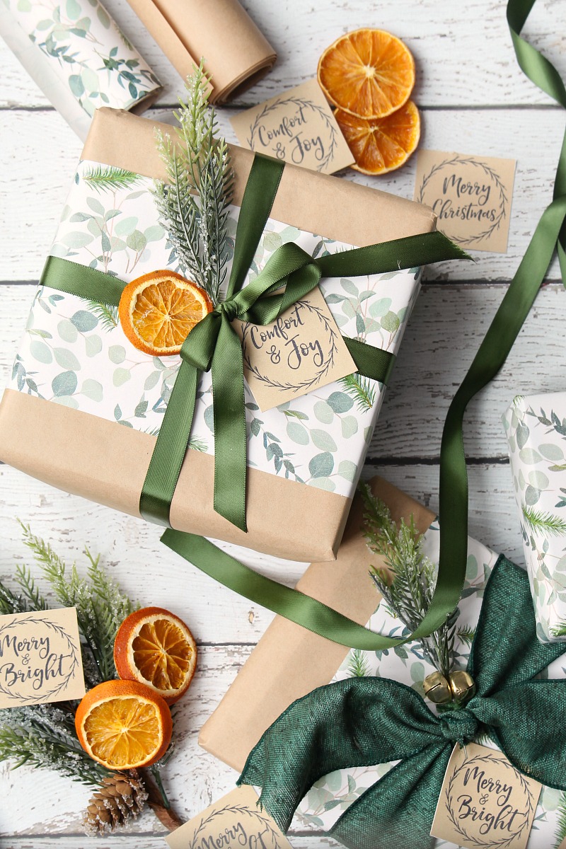 Pretty Christmas packages wrapped with kraft paper and dried oranges.