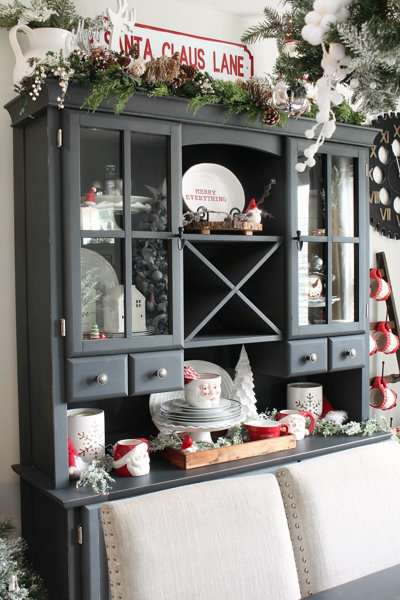 Christmas Hutch decorated for Christmas with red and white accents.