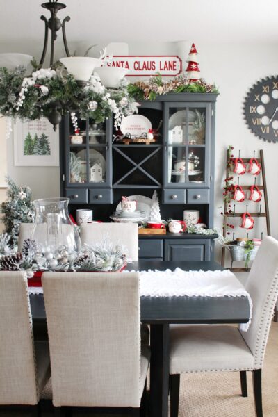 Beautiful Christmas dining room decorated with fun red and white touches.