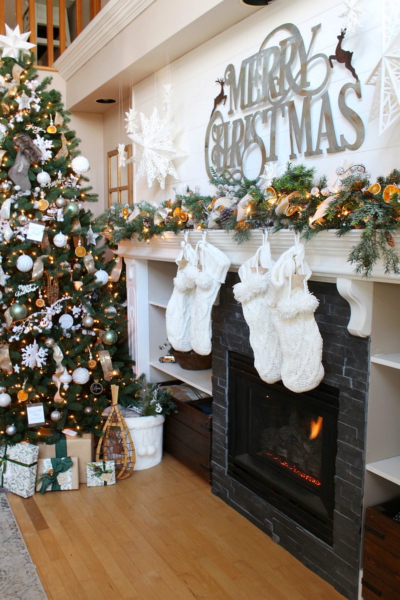 Beautiful Christmas mantel decor ideas and Christmas tree with dried oranges.