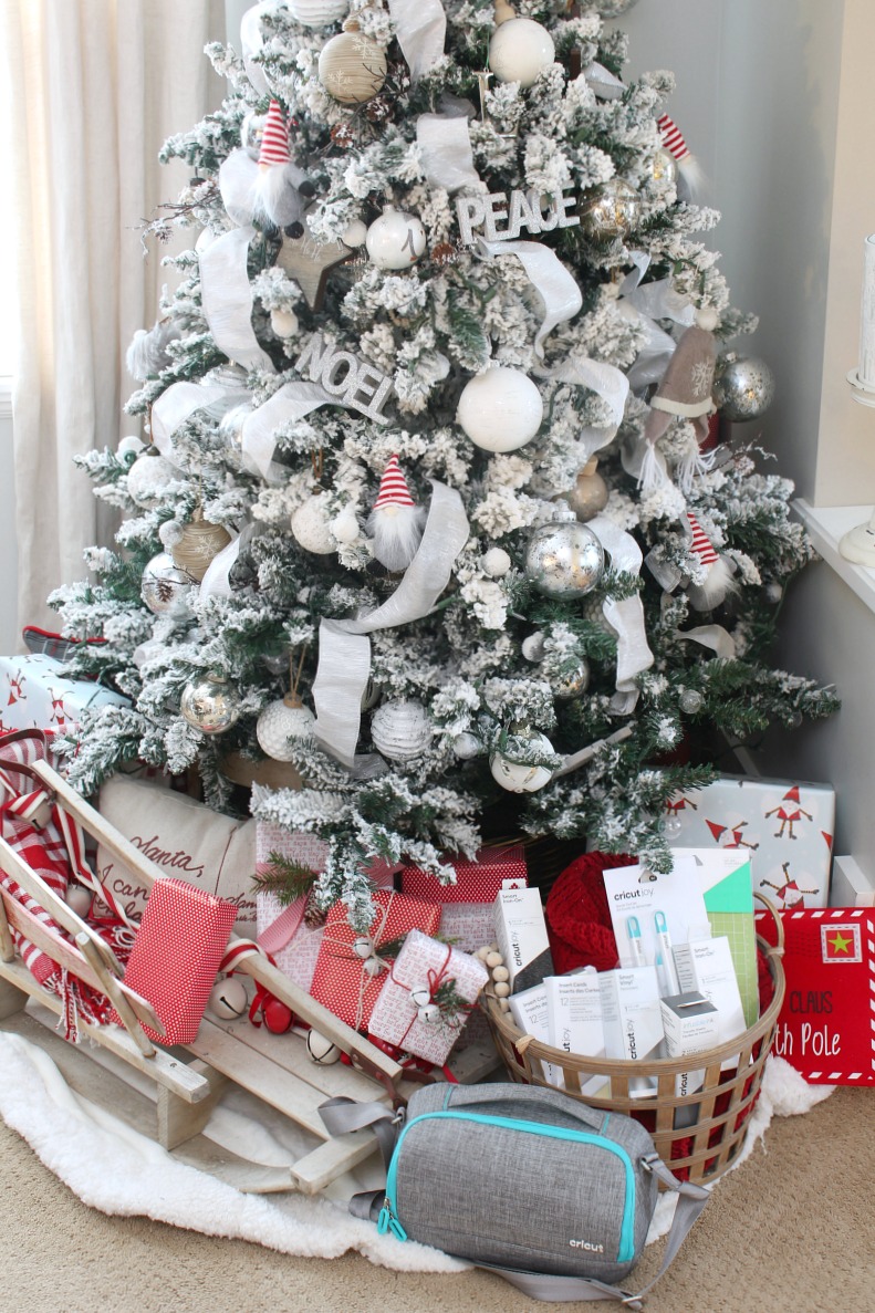 Cricut Joy gift basket under a pretty, flocked Christmas tree.