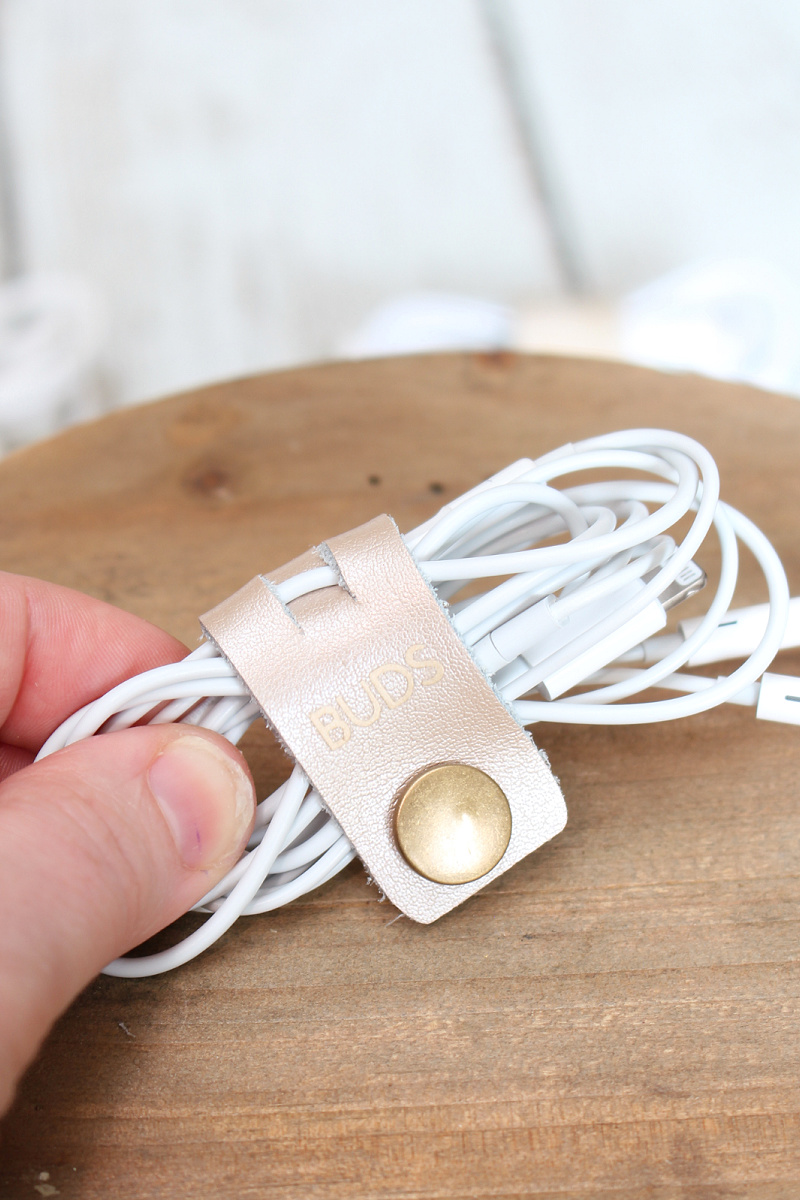 DIY cord organizer with snap fastener.