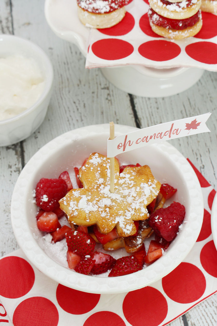 Strawberry shortcake recipe with maple leaf shaped shortcake for Canada Day.
