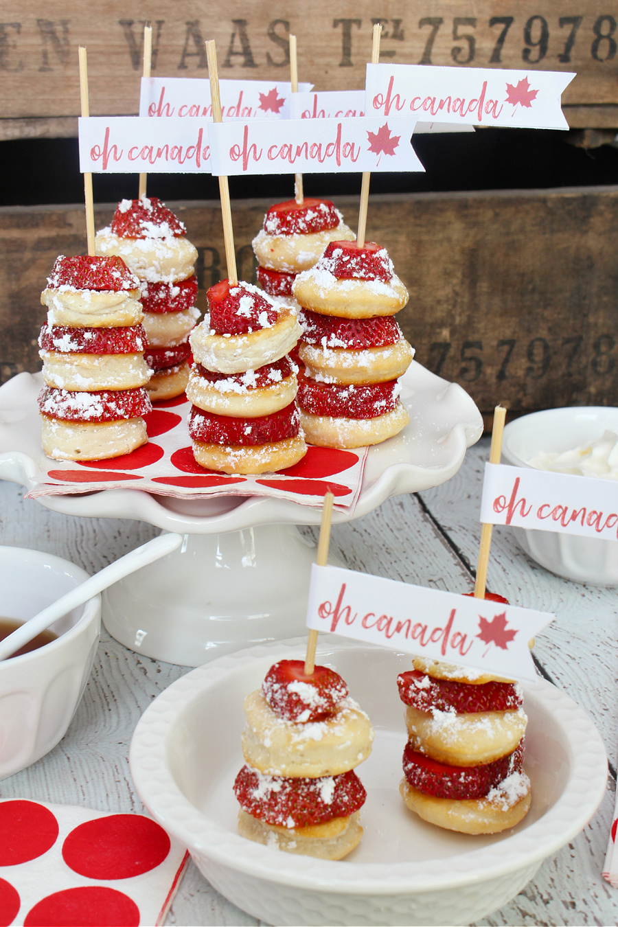 Strawberry shortcake on a stick with 'Oh Canada" dessert topper.