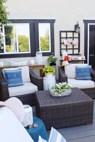 Backyard patio with club house chairs.