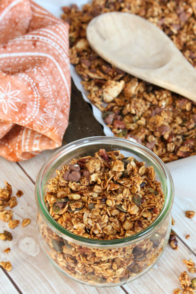 Homemade pumpkin spice granola in a Wick jar.