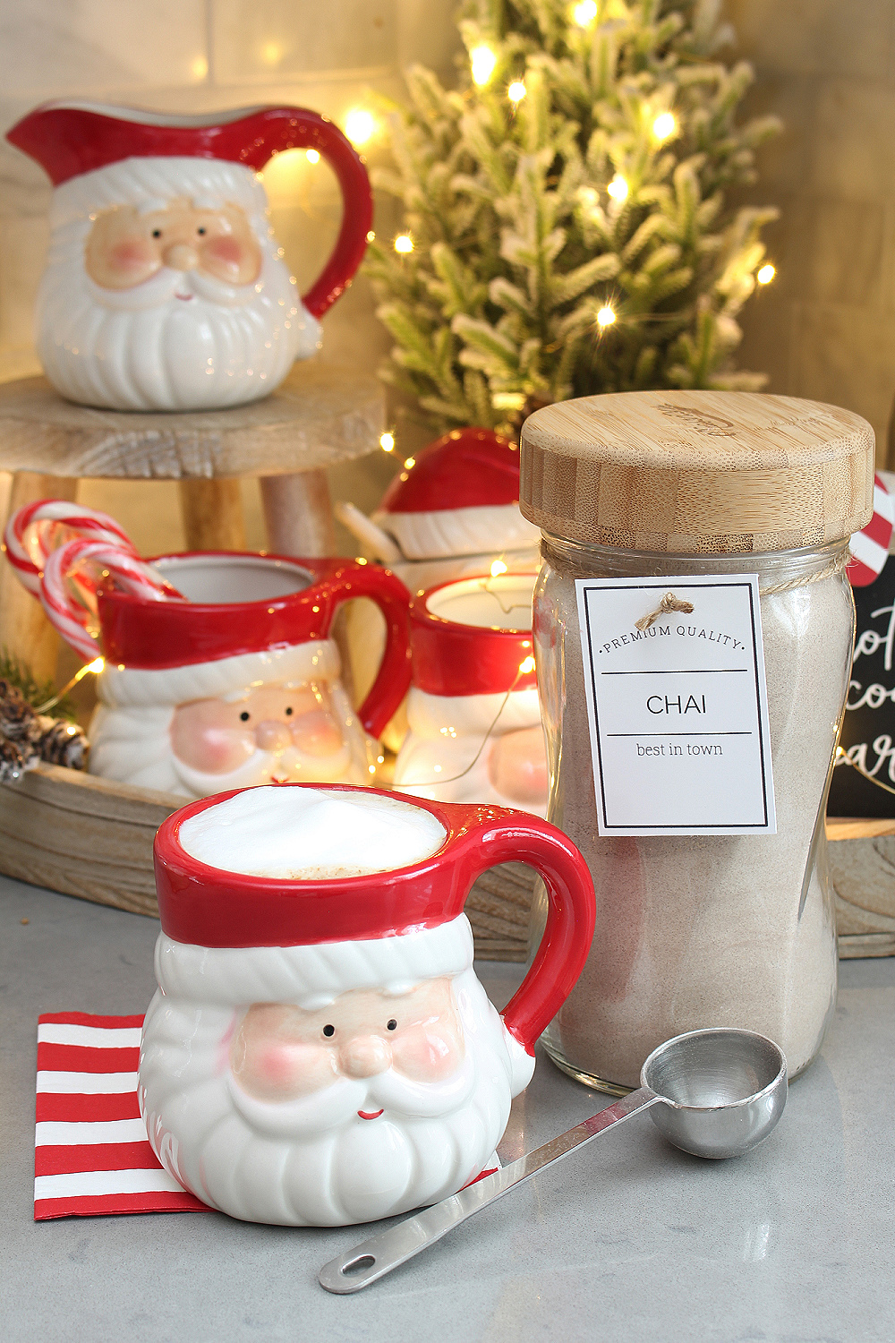Hot beverage bar with chai latte and Santa mug.