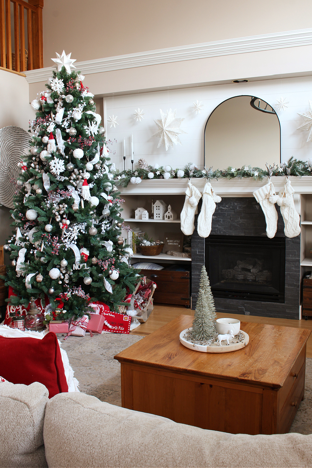 Red and white living room Christmas decor.