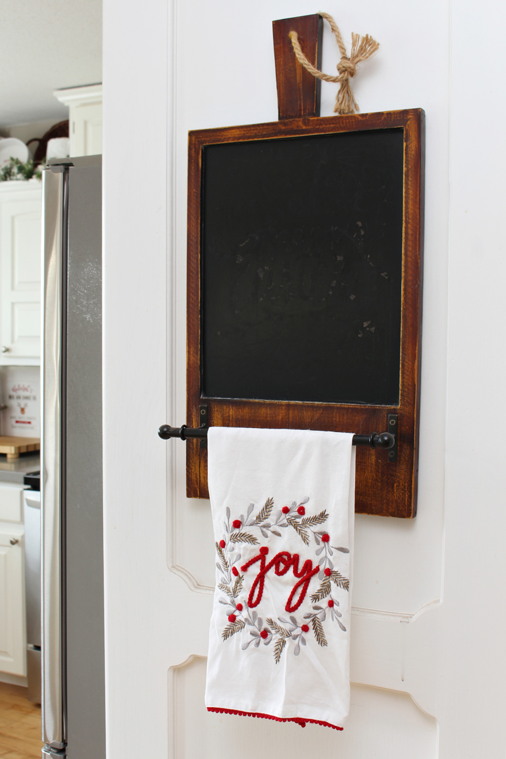 Chalkboard towel holder with Christmas towel.