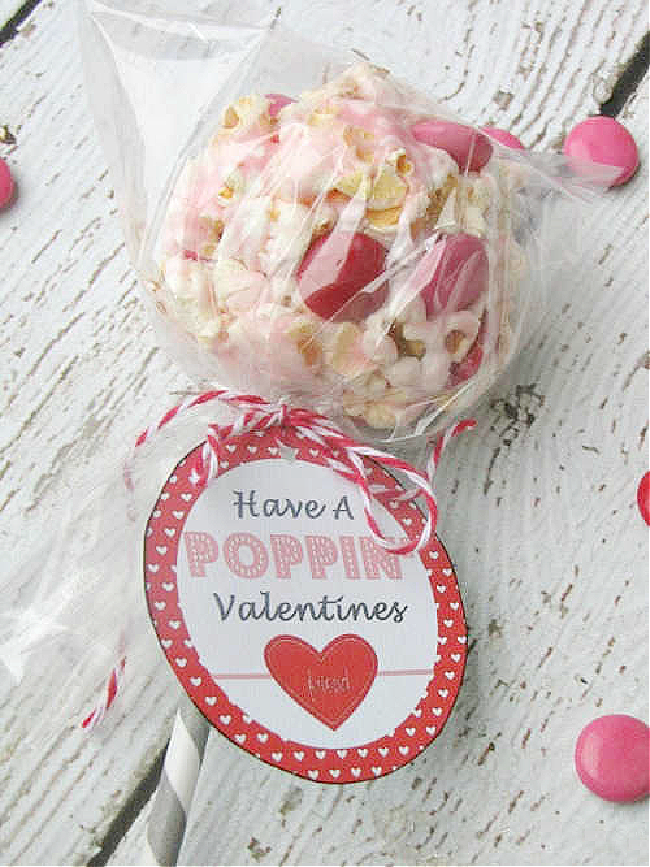 Valentine's Day popcorn balls with free Valentine's Day popcorn tags.