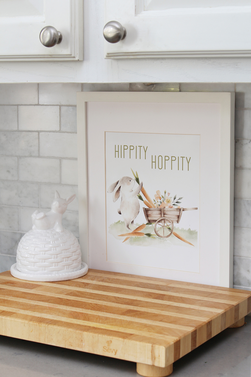 Hippity Hoppity free Easter printable displayed in a kitchen.