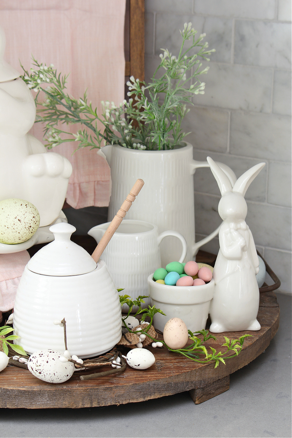 Simple Easter bunny bowl with mini eggs in a spring kitchen vignette.