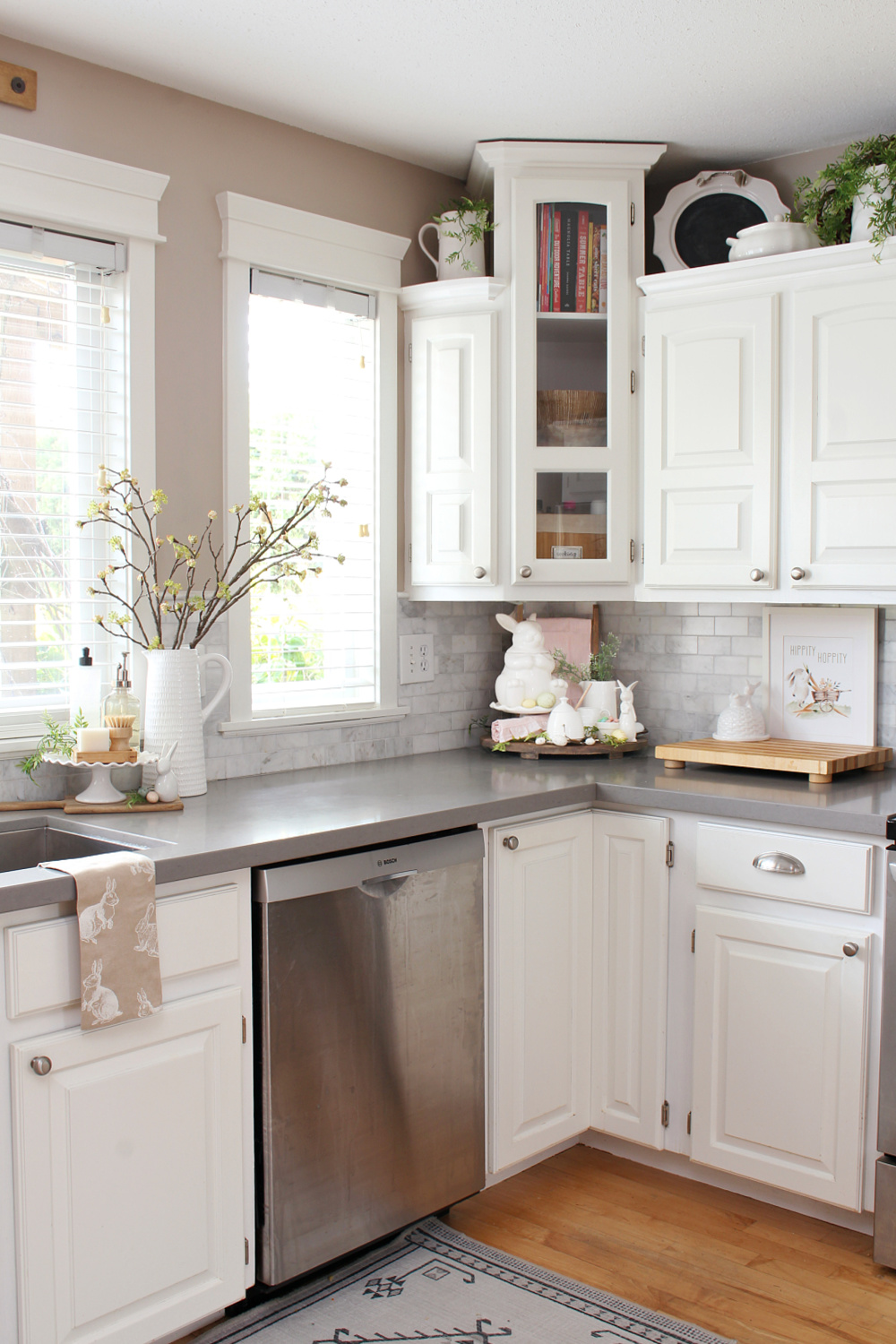 White kitchen decorated for spring and Easter.