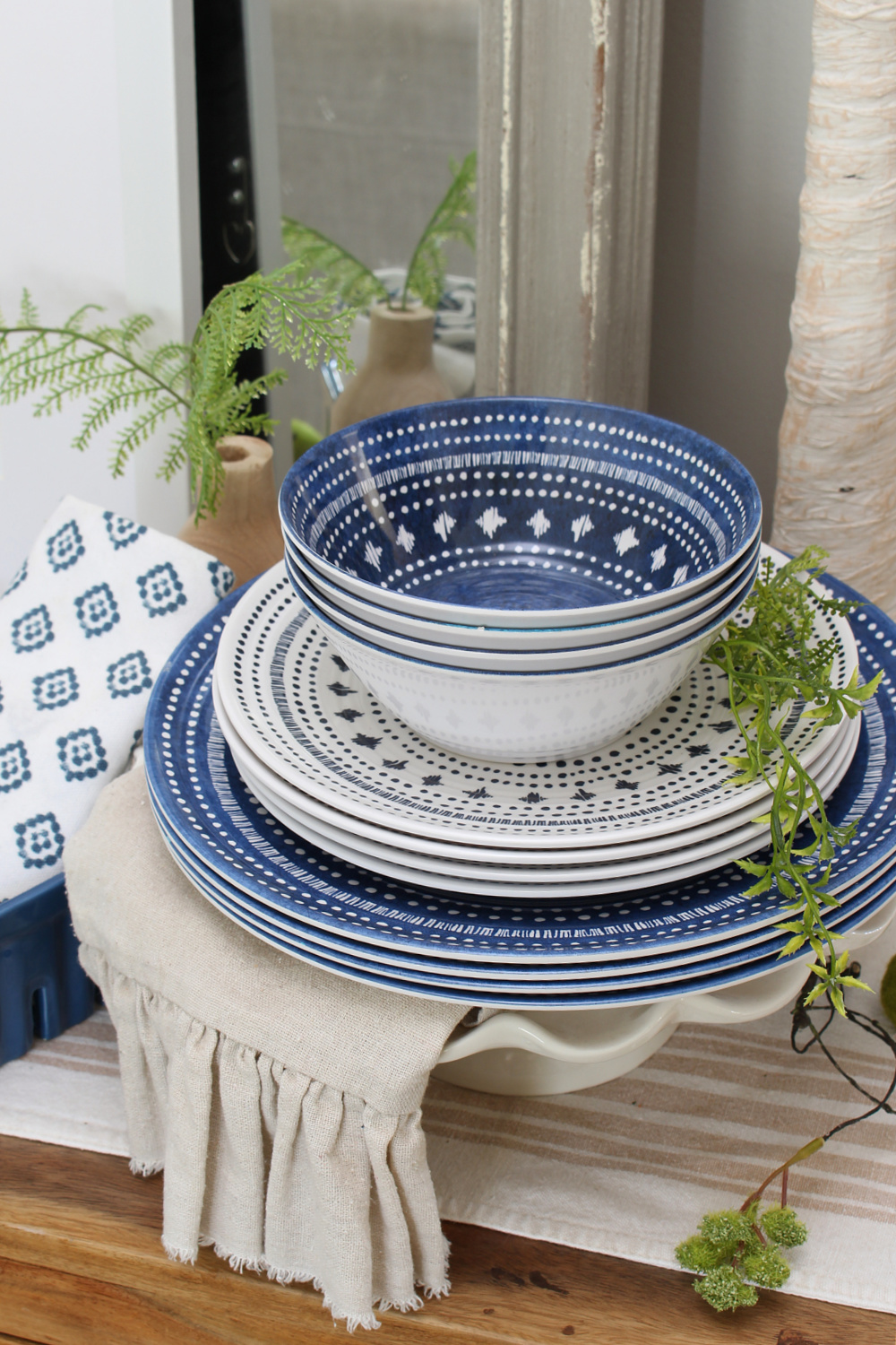 Summer dining room with melamine plates and bowls.