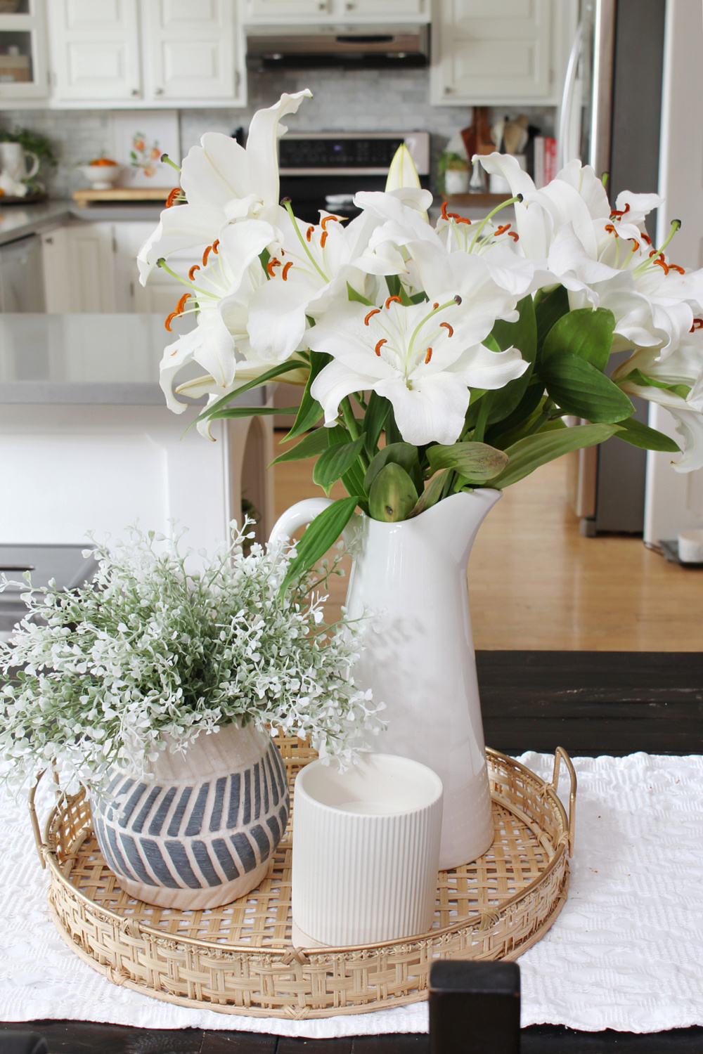 Summer centerpiece with white lillies.
