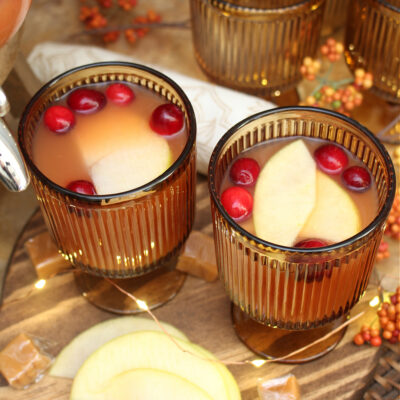 Apple cider fall punch in amber glasses.