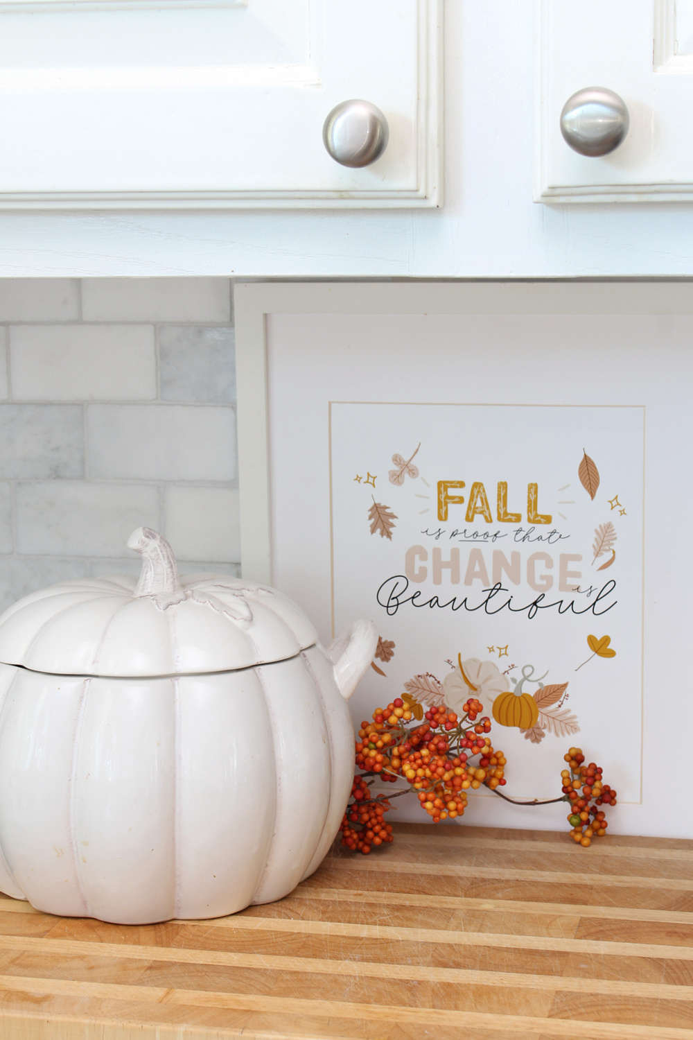 Free fall printable displayed in the kitchen