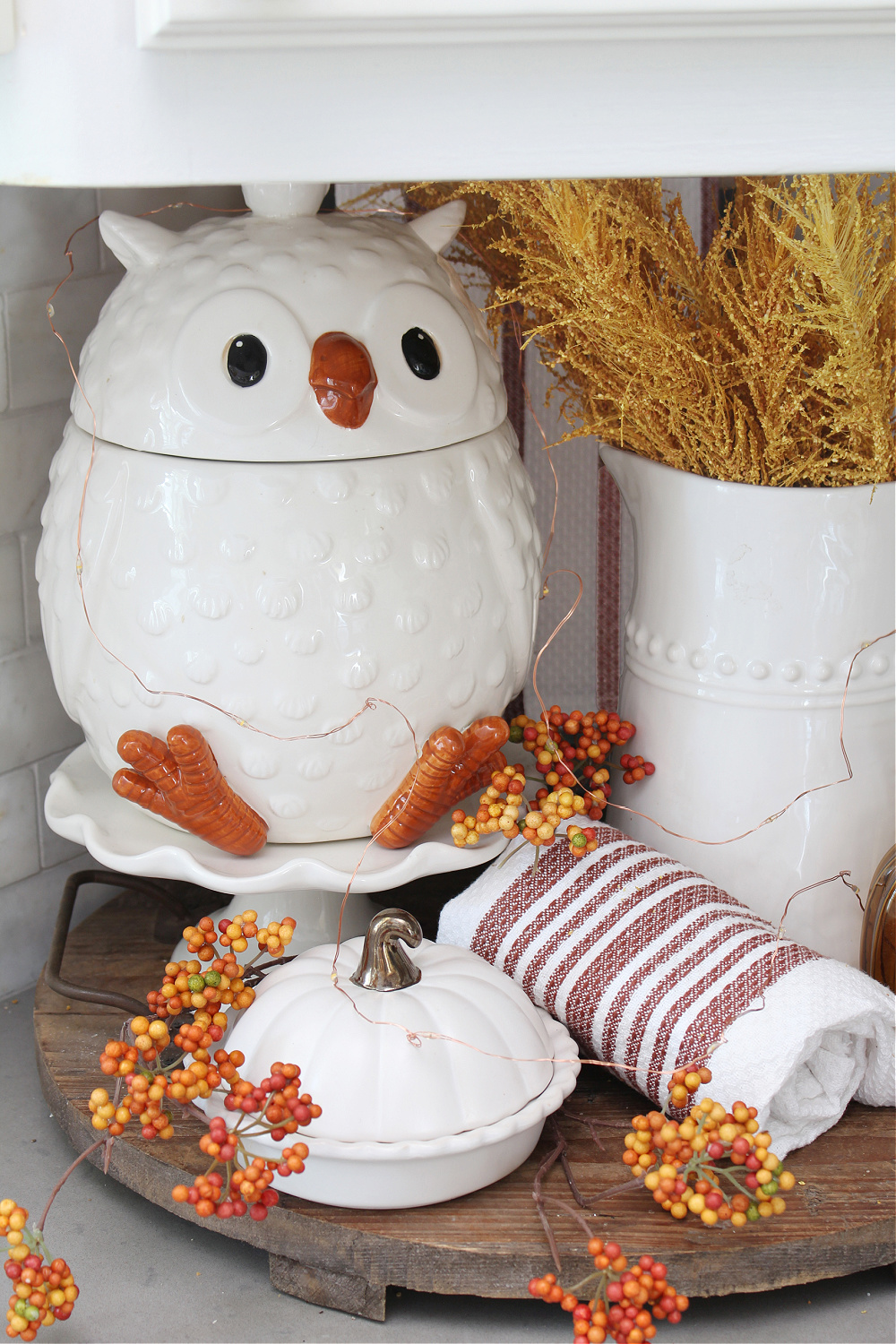 Cute fall kitchen vignette with owl cookie jar.