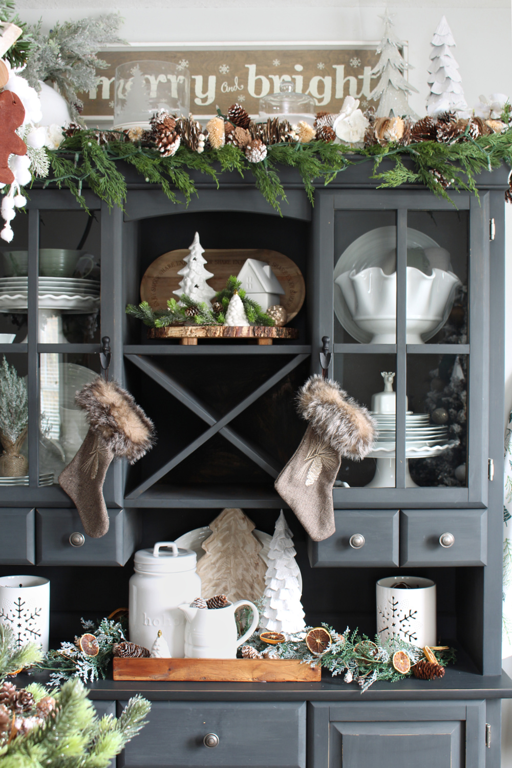 Black painted buffet and hutch decorated for Christmas.