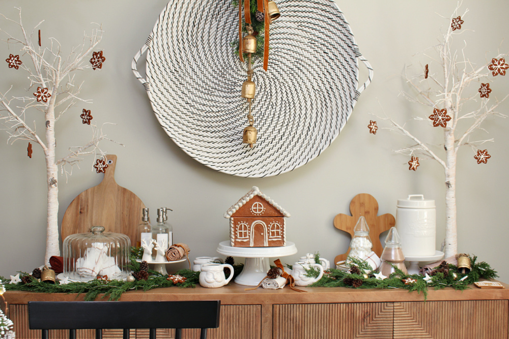 Gingerbread hot chocolate bar with gingerbread house cookie jar.