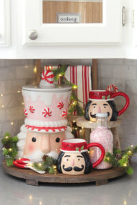 Christmas tray with Nutcracker cookie jar and mugs.